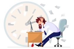 Mann hinter Computer mit tickender Uhr im Hintergrund